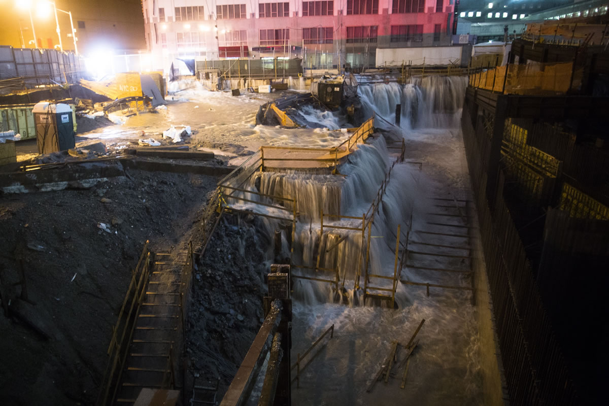 Sea water floods the Ground Zero construction site Monday in New York.