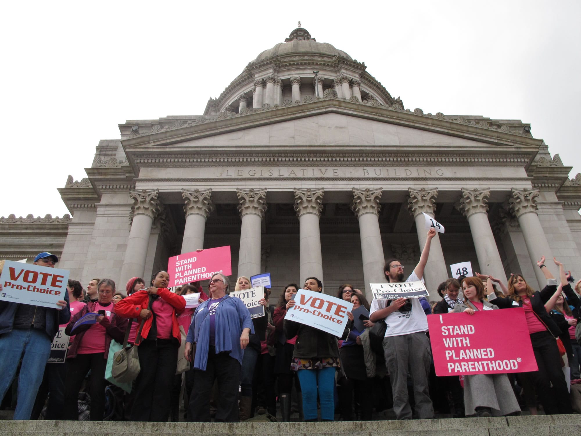 Abortion-rights supporters hold a rally at the Capitol on Monday in Olympia.