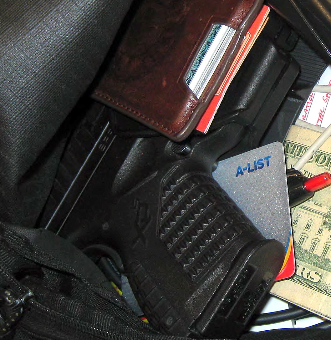A gun among personal belongings that was confiscated in a carry-on bag at the airport.