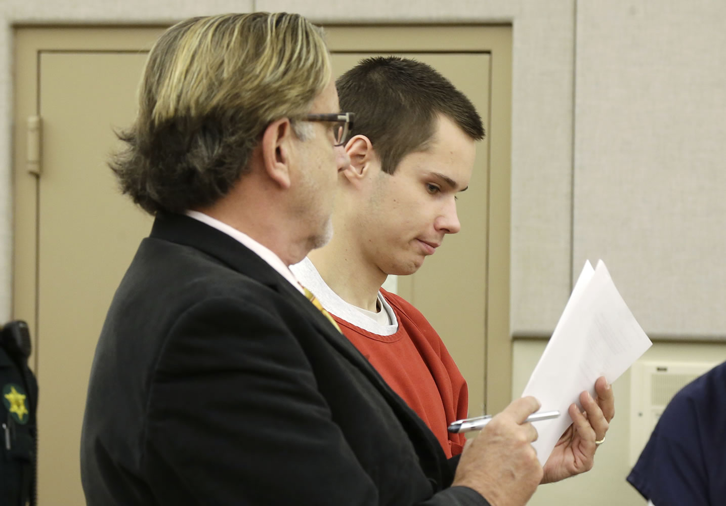 Colton Harris-Moore, right, also known as the &quot;Barefoot Bandit,&quot; appears in a court hearing with his attorney, John Henry Browne, left, Thursday in Mount Vernon.