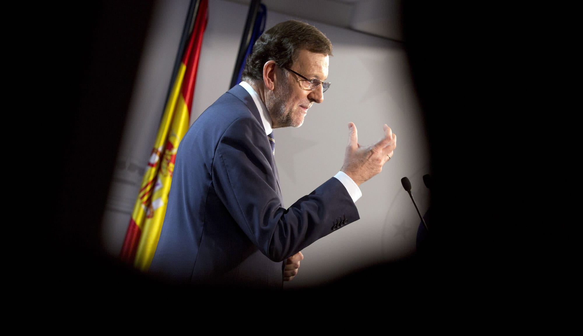 Spanish Prime Minister Mariano Rajoy gestures while speaking during a media conference after an EU summit in Brussels on Friday.
