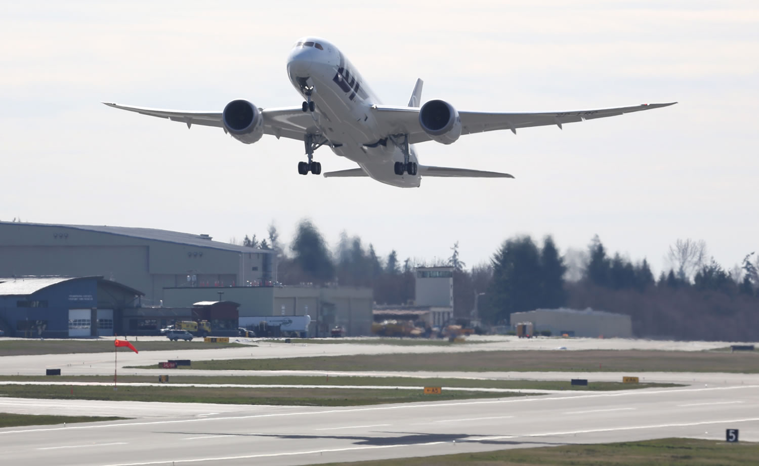 A Boeing 787 lifts off March 25 at Paine Field in Everett.