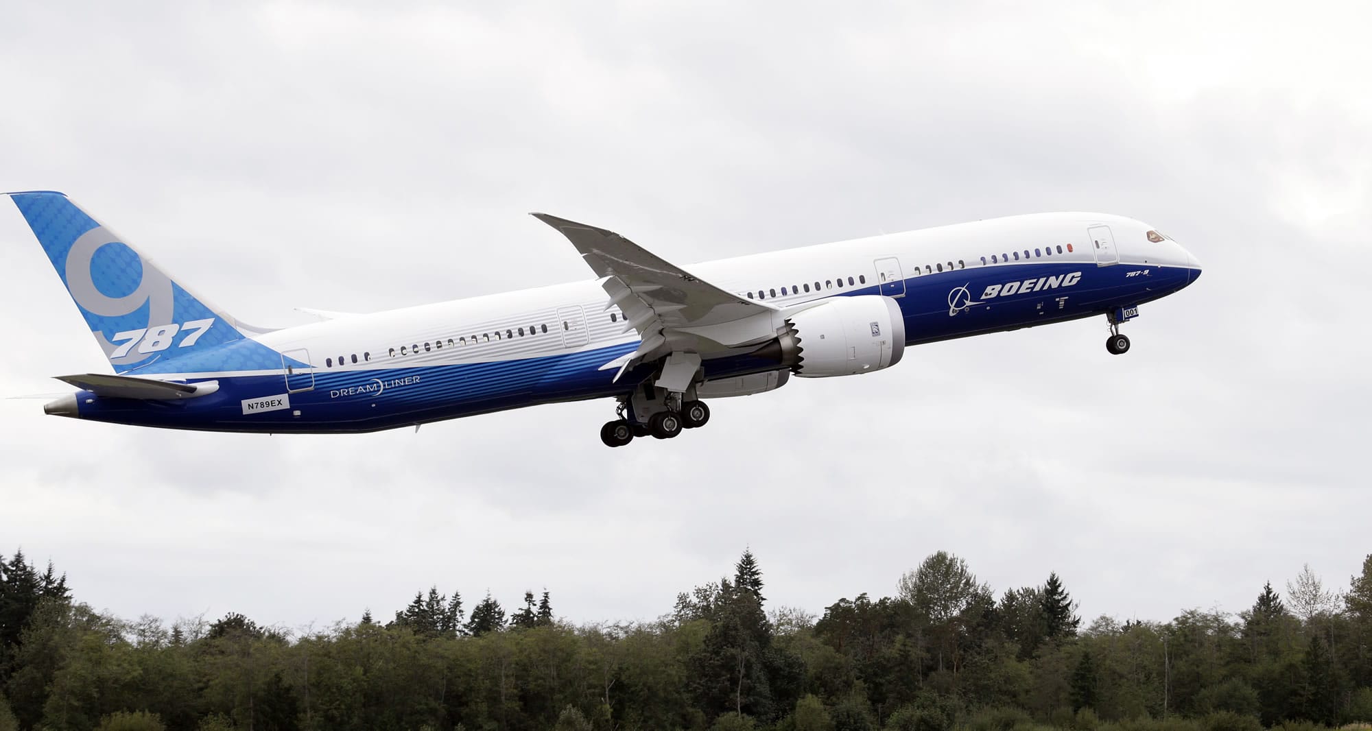 A Boeing 787-9 takes off on a first flight of the new aircraft Tuesday at Paine Field in Everett, Wash. Boeing spokeswoman Kate Bergman says the 787-9 is 20 feet longer and can seat 40 more passengers than the original 787-8, which carries between 210 and 250 passengers.