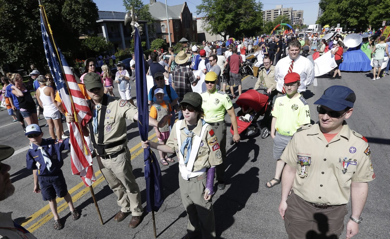 Boy Scouts line up before marching in the Utah Gay Pride Parade in Salt Lake City on Sunday.