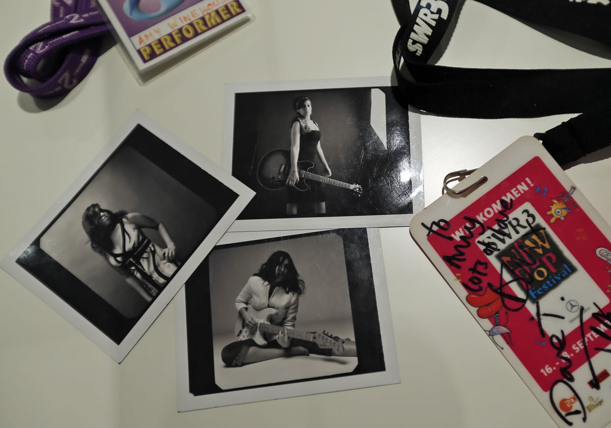 Stage passes and photographs are part of an exhibit on Amy Winehouse at London's Jewish Museum.