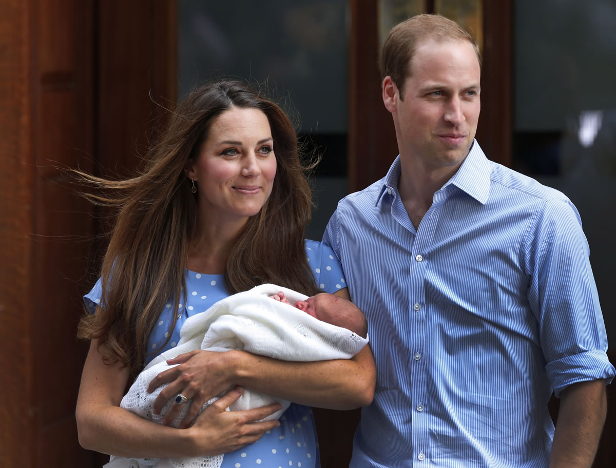 Britain's Prince William and Kate, Duchess of Cambridge, introduce His Royal Highness Prince George of Cambridge to the world Tuesday outside St.