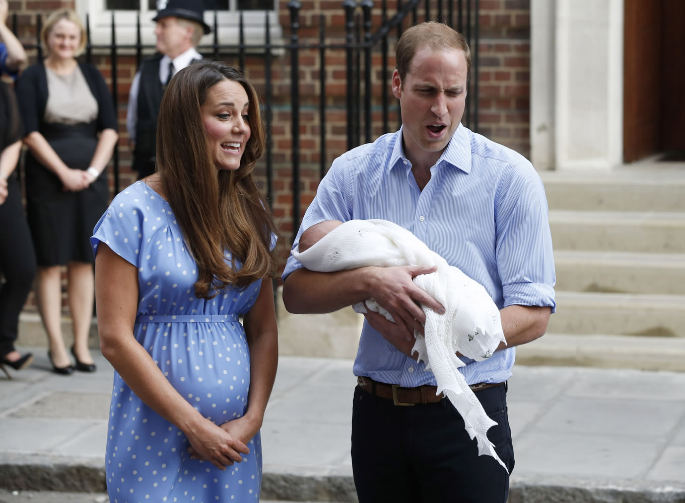 Britain's Prince William and Kate, Duchess of Cambridge hold the Prince of Cambridge on Tuesday as they pose for photographers outside St. Mary's Hospital exclusive Lindo Wing in London where the Duchess gave birth on Monday.