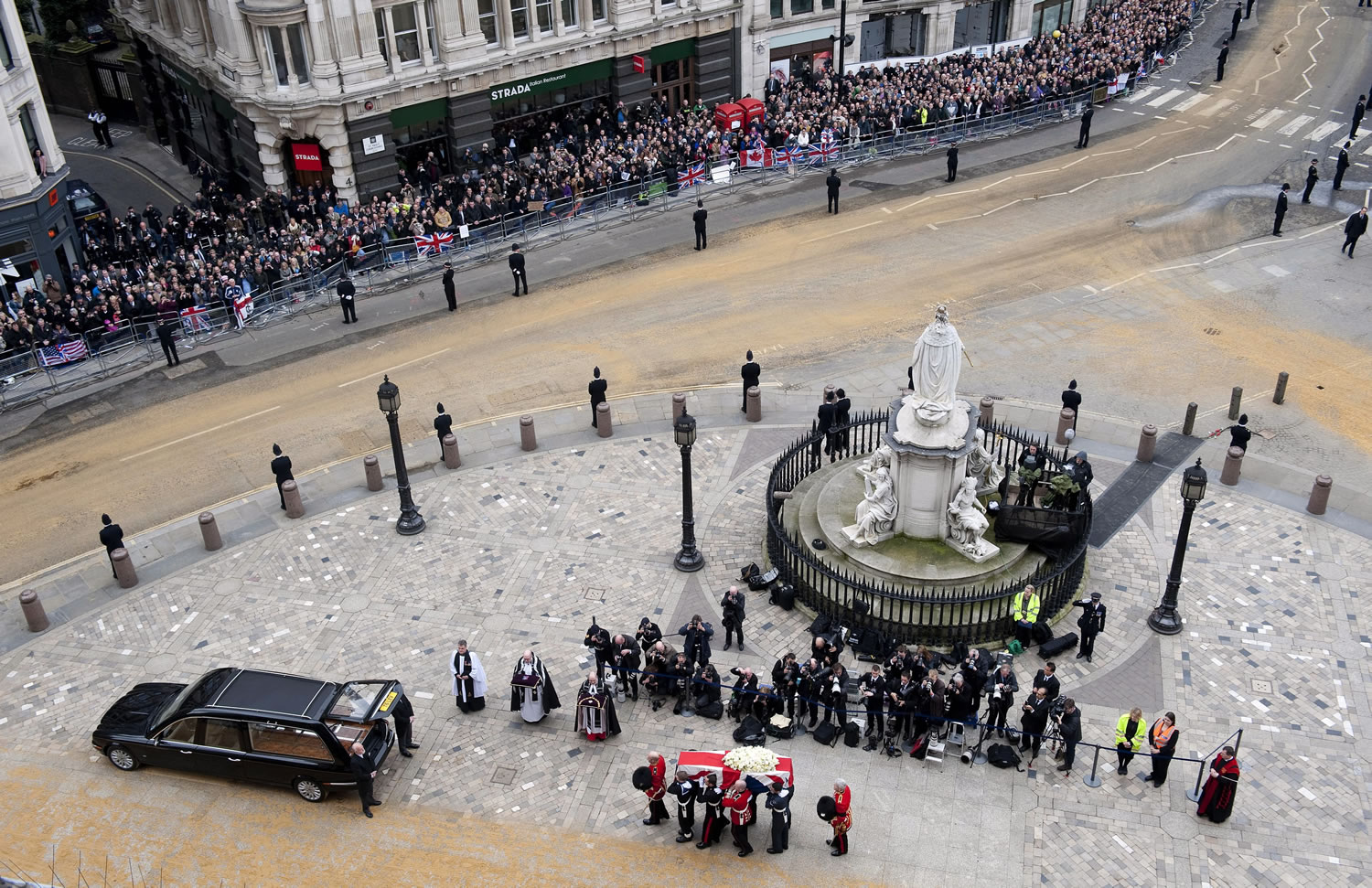 The Union flag-draped coffin holding the body of British former Prime Minister Margaret Thatcher is carried from St. Paul's Cathedral in London, after the funeral service, Wednesday.