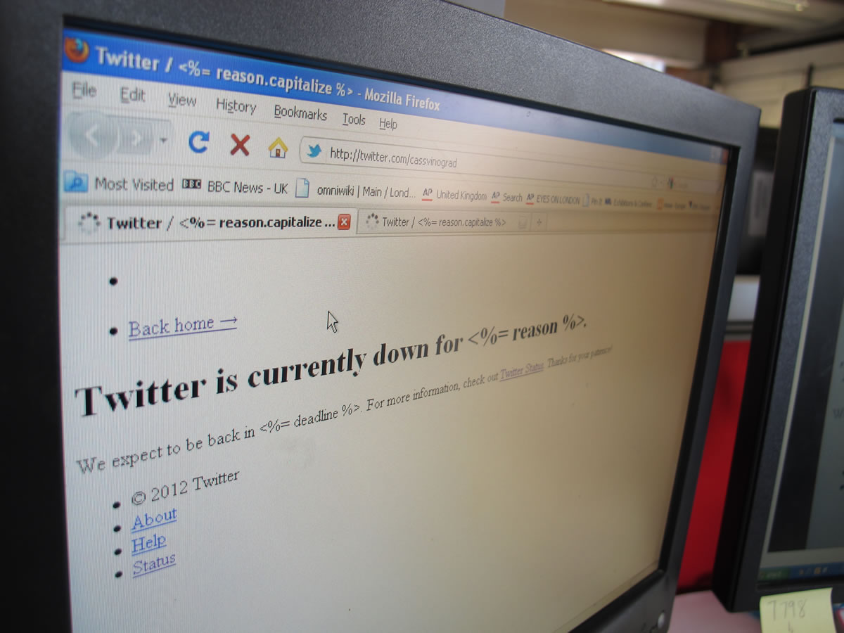 A screen displays the the micro-blogging site Twitter in London today. Twitter says that people may have trouble accessing its site.