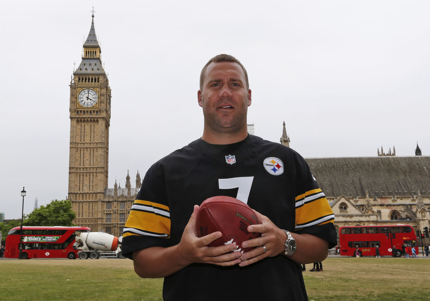 Ben Roethlisberger, quarterback of the Pittsburgh Steelers, poses for photographers, backdropped by the Houses of Parliament and Big Ben in central London, Tuesday, July 2, 2013. Pittsburgh Steelers will play against the Minnesota Vikings at Wembley Stadium in London, on Sunday Sept. 29, 2013.