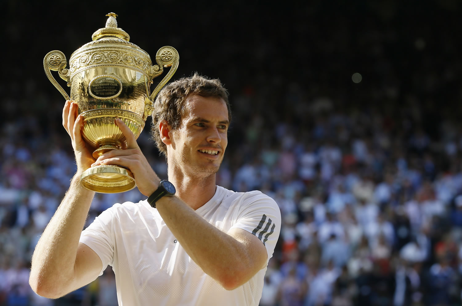 Andy Murray defeating Novak Djokovic in straight sets Sunday to become the first British tennis player in 77 years to win the Wimbledon men's singles title.
