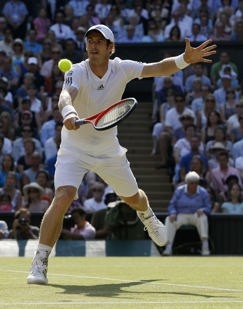 Andy Murray of Britain plays a return to Novak Djokovic of Serbia during the Wimbledon men's singles final on Sunday.