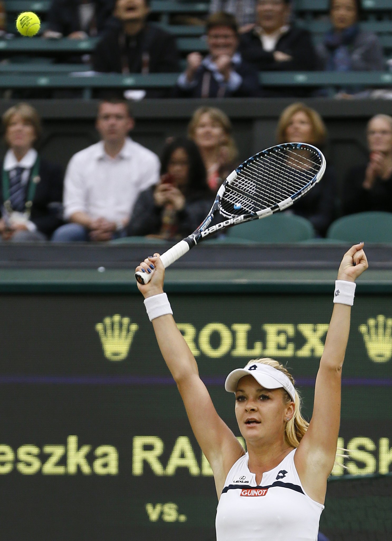 Agnieszka Radwanska of Poland reacts after defeating Li Na of China in the Wimbledon quarterfinals on Tuesday.
