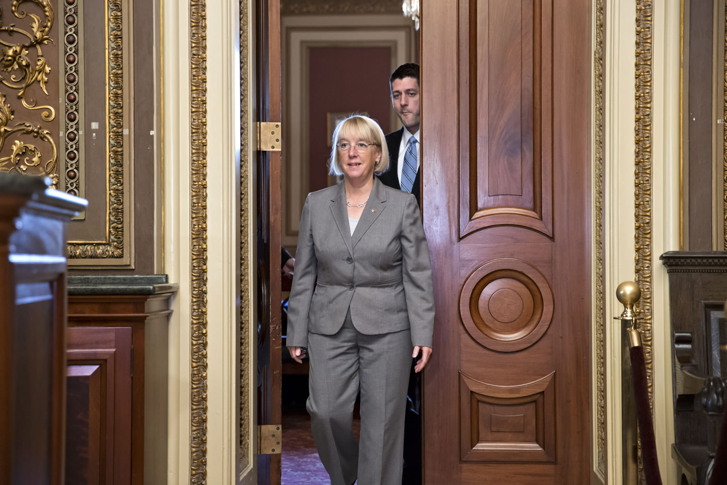 Senate Budget Committee Chair Patty Murray, D-Wash., front, and House Budget Committee Chairman Paul Ryan, R-Wisc., rear,  emerge from an initial meeting of the bipartisan budget conferees from both houses of Congress on Oct.