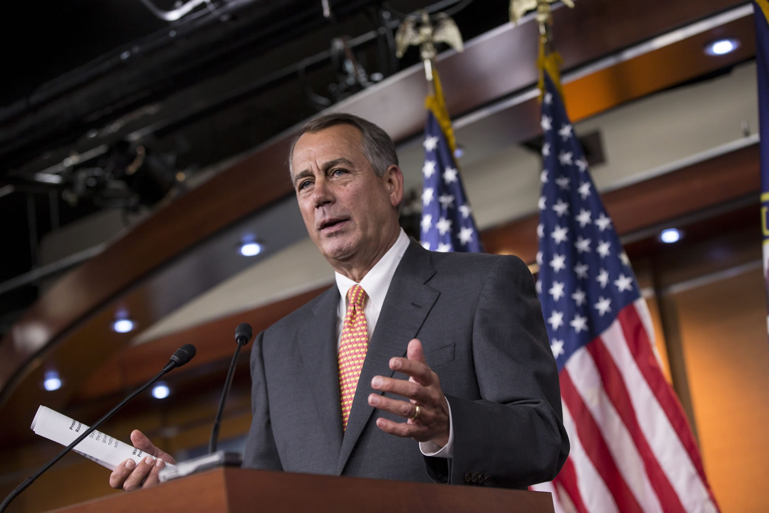 Speaker of the House John Boehner, R-Ohio, talks to reporters about the deadline to fund the government and the fight among House Republicans, on Capitol Hill in Washington on Thursday.