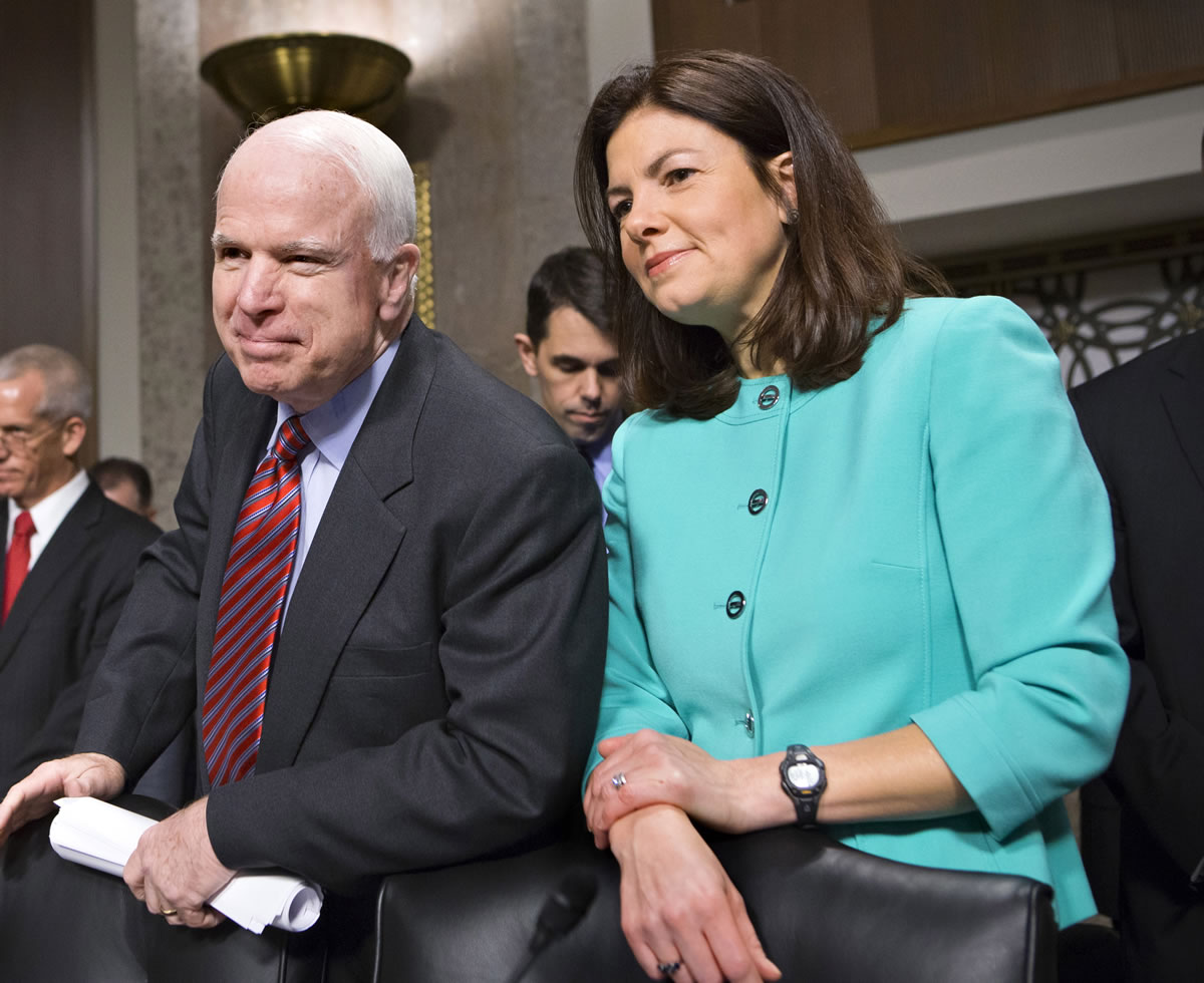 Sen. John McCain, R-Ariz., left, and Sen.