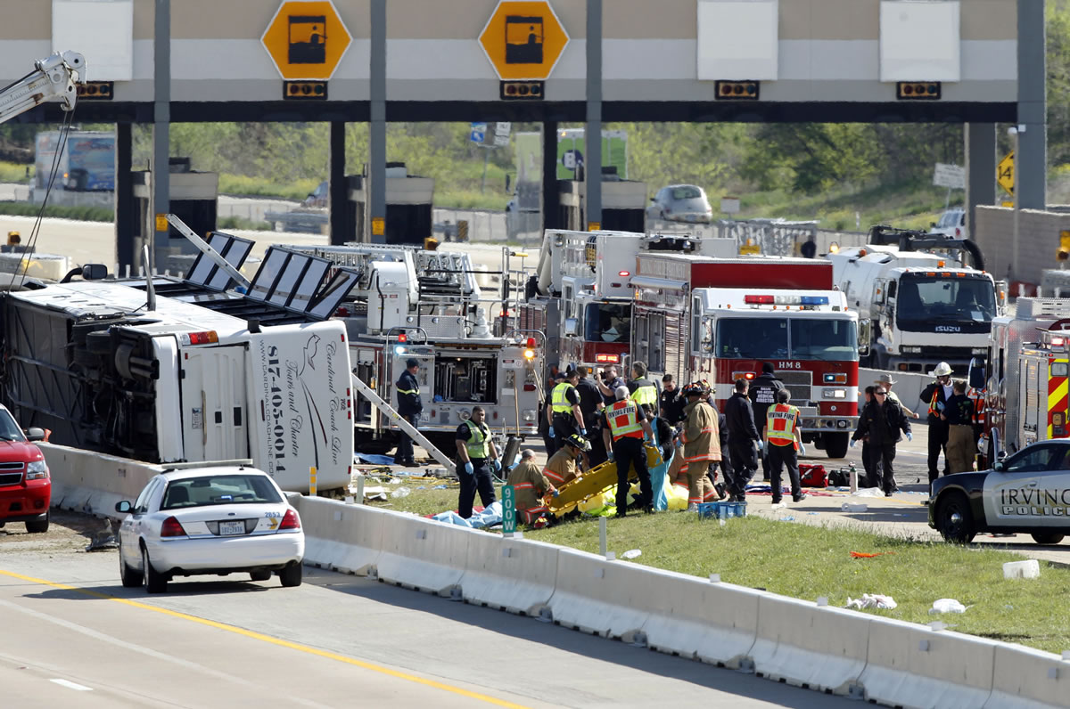 First responders are on the scene of a Cardinal Coach Line charter bus accident on Highway 161 in Irving, Texas on Thursday morning.
