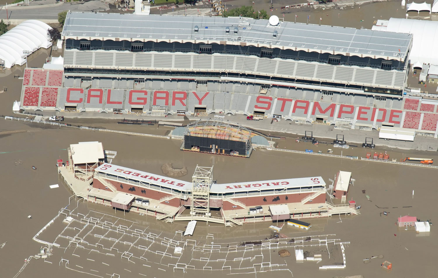 The Calgary Stampede stadium in Calgary, Alberta, Canada flooded on Saturday.  The two rivers that converge on Calgary are starting to recede after floods devastated much of the southern Alberta province, causing at least three deaths and forcing thousands to evacuate.  The flooding forced authorities to evacuate Calgary's entire downtown and hit some of the cityis iconic structures hard.