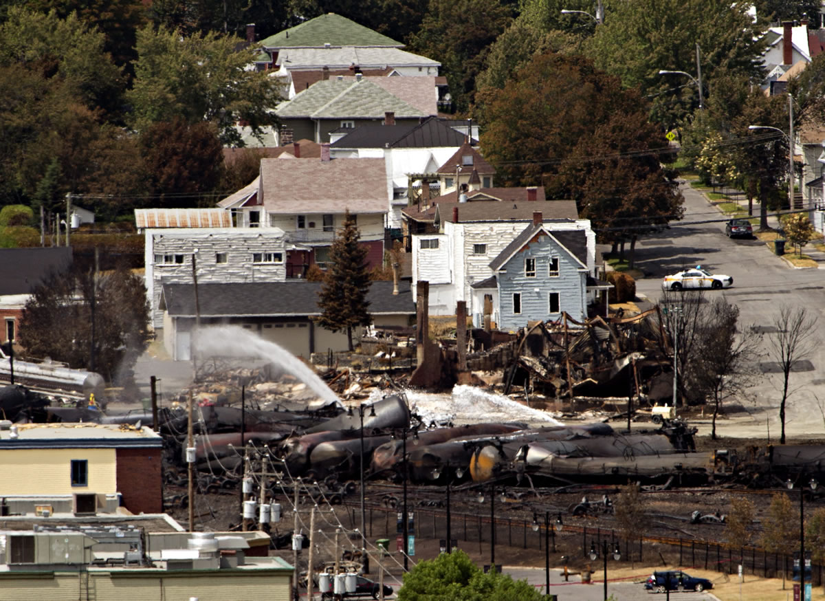 Wreckage is strewn throughout the downtown core in Lac-Megantic, Quebec, on Monday after a train derailed early Saturday, igniting tanker cars carrying crude oil.