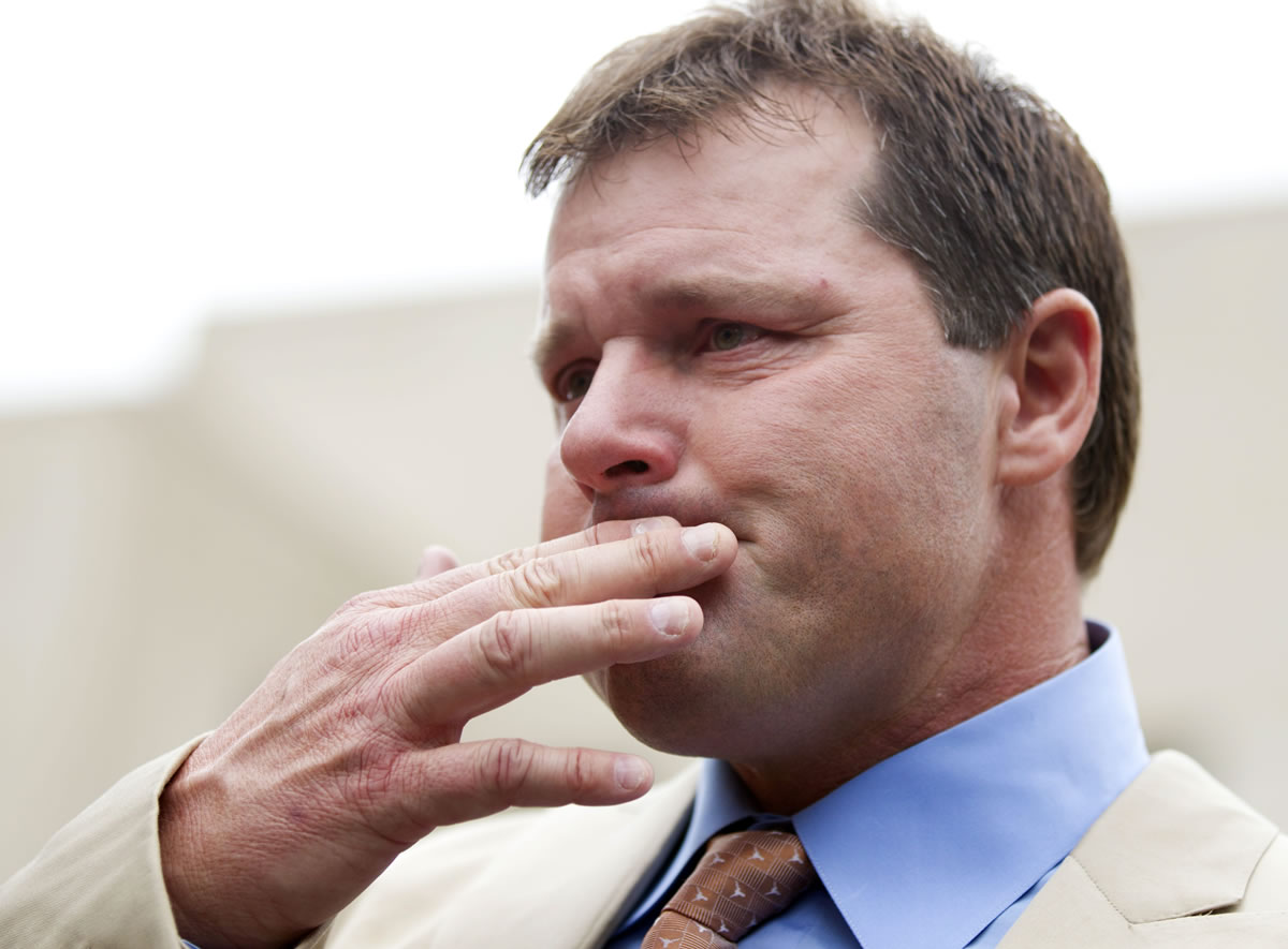 Former Major League Baseball pitcher Roger Clemens holds back tears as he talks to the media outside federal court in Washington on Monday after his acquittal on charges of lying to Congress in 2008 when he denied ever using performance-enhancing drugs.