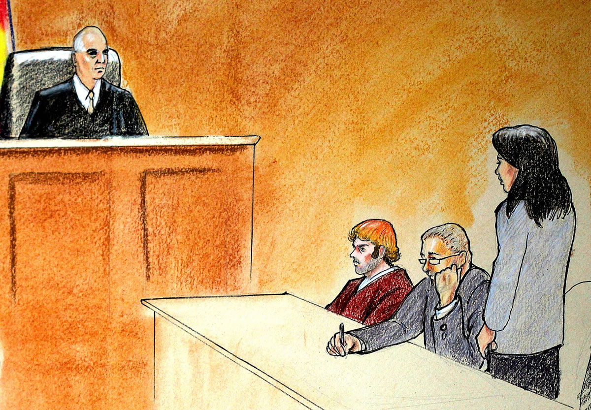 In this courtroom sketch, suspect James Holmes, third from right, sits in district court today in Centennial, Colo., during his arraignment where he was formally charged with 24 counts of murder and 116 counts of attempted murder in the shooting rampage at an Aurora movie theater, on July 20.