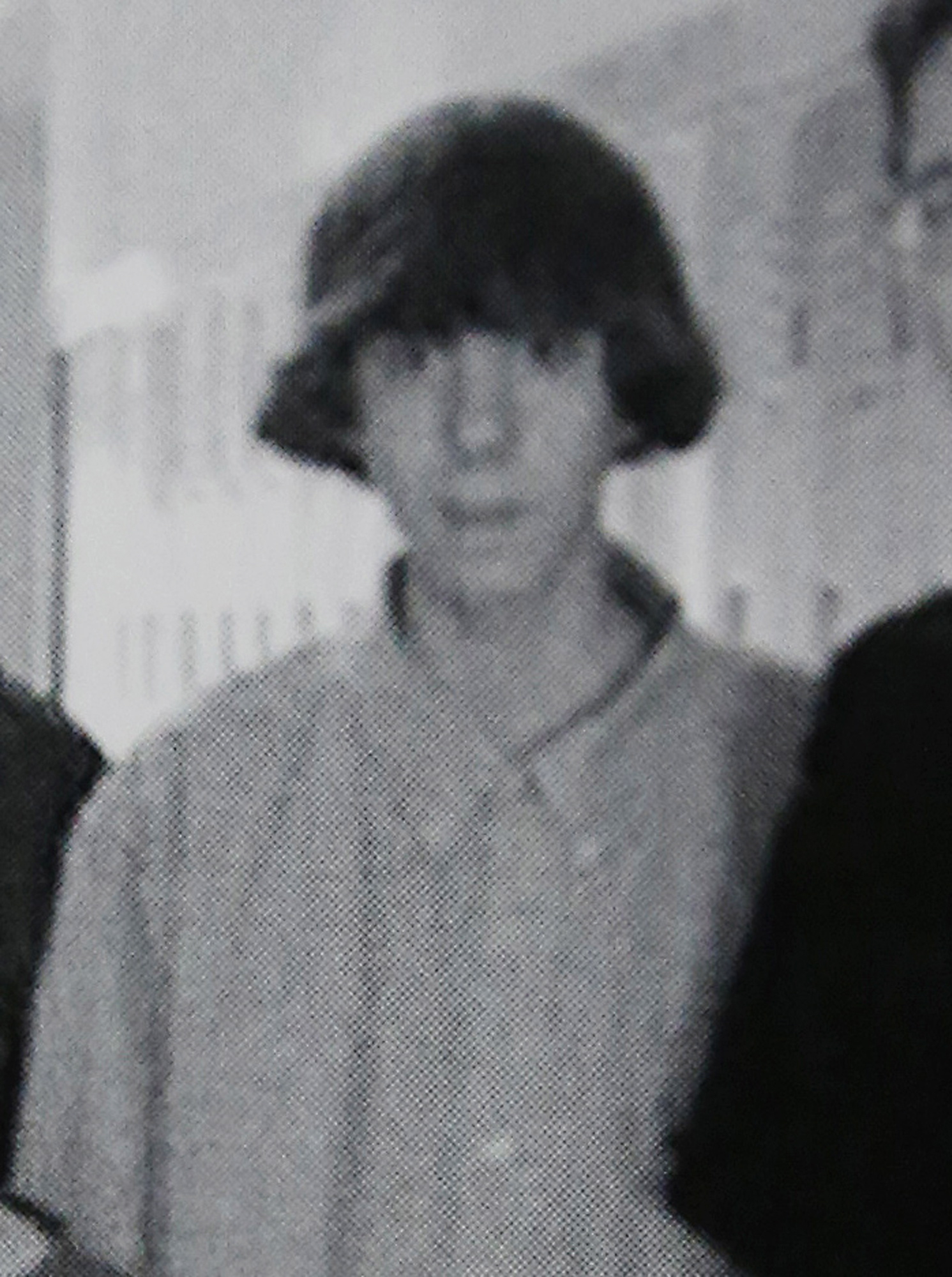 This undated photo shows Adam Lanza posing for a group photo of the technology club which appeared in the Newtown High School yearbook. Authorities have identified Lanza as the gunman who killed his mother at their home and then opened fire Friday, Dec. 14, 2012, inside an elementary school in Newtown, Conn., killing 26 people, including 20 children, before killing himself.  Richard Novia, a one-time adviser to the technology club, verified that the photo shows Lanza.