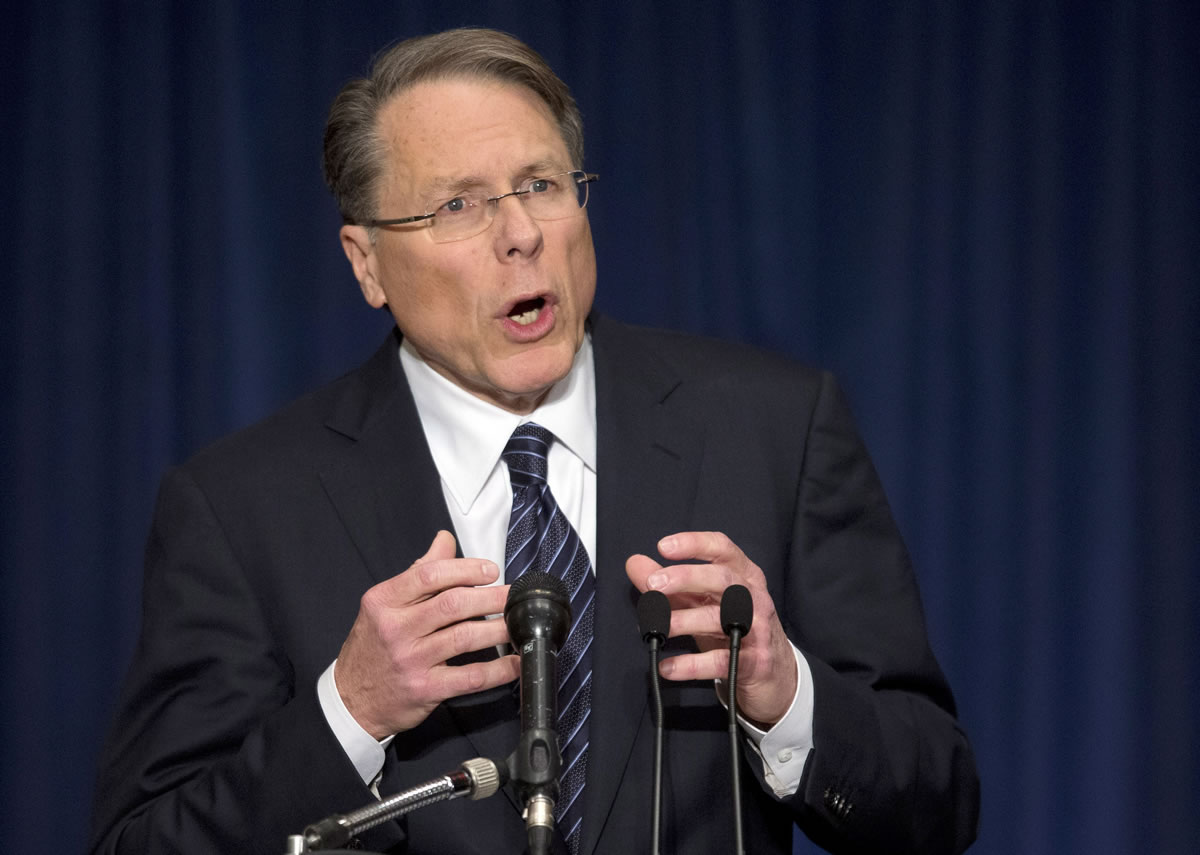 The National Rifle Association executive vice president Wayne LaPierre, gestures during a news conference in response to the Connecticut school shooting on Friday, in Washington.