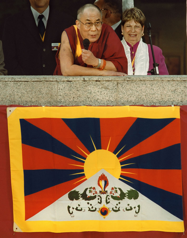 The Dalai Lama addresses a crowd May 13, 2001, as Portland Mayor Vera Katz stands at right in Portland.