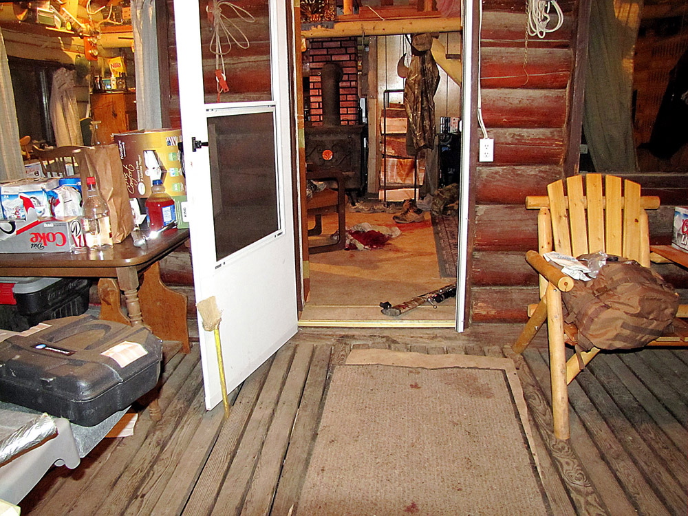 This undated photo provided by the Grant County Sheriff shows a cabin near Granite, Ore., where a 14-year-old boy shot and killed two others and accidentally shot and wounded himself during a hunting trip on Wednesday.