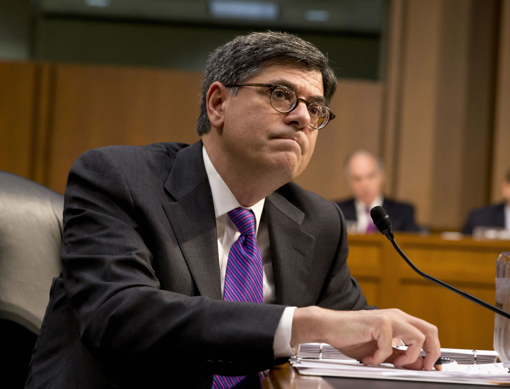 Treasury Secretary Jacob Lew listens while testifying on Capitol Hill in Washington.