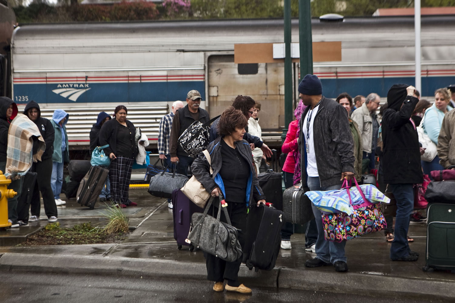 Passengers from Amtrak's Empire Builder line coming from Chicago and points east of Seattle wait at the train station in Mukilteo for buses to take them to Seattle, Edmonds and Redmond.