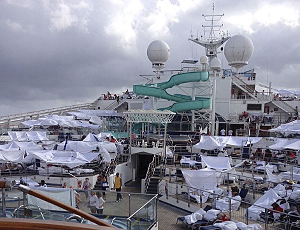 Passengers with makeshift tents are seen on the the deck of the Carnival Triumph cruise ship at sea in the Gulf of Mexico on Sunday.