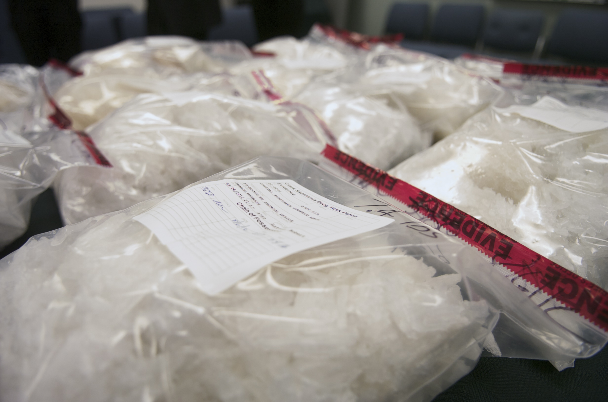 Several bags on methamphetamine sit on display at the Clark County Sheriff's Office headquarters Wednesday. The Clark-Vancouver Regional Drug Task Force seized 74 lbs.