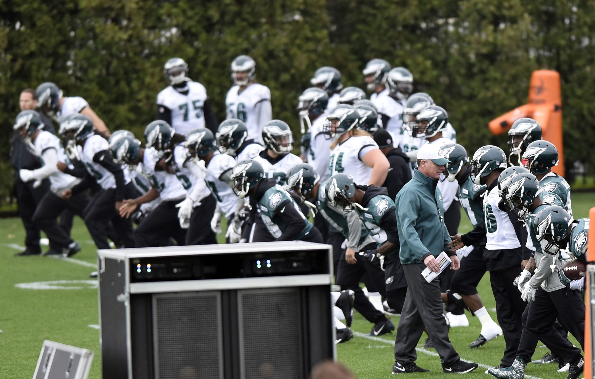 Philadelphia Eagles interim head coach Pat Shurmur, front right, watches during NFL football practice Wednesday in Philadelphia. The Eagles fired head coach Chip Kelly with one game left in his third season.