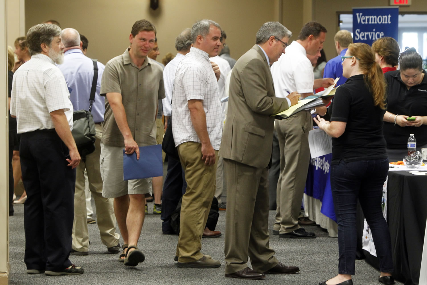People line up at the job fair  in South Burlington, Vt.  The 162,000 jobs the economy added in July were a disappointment. The quality of the jobs was even worse.