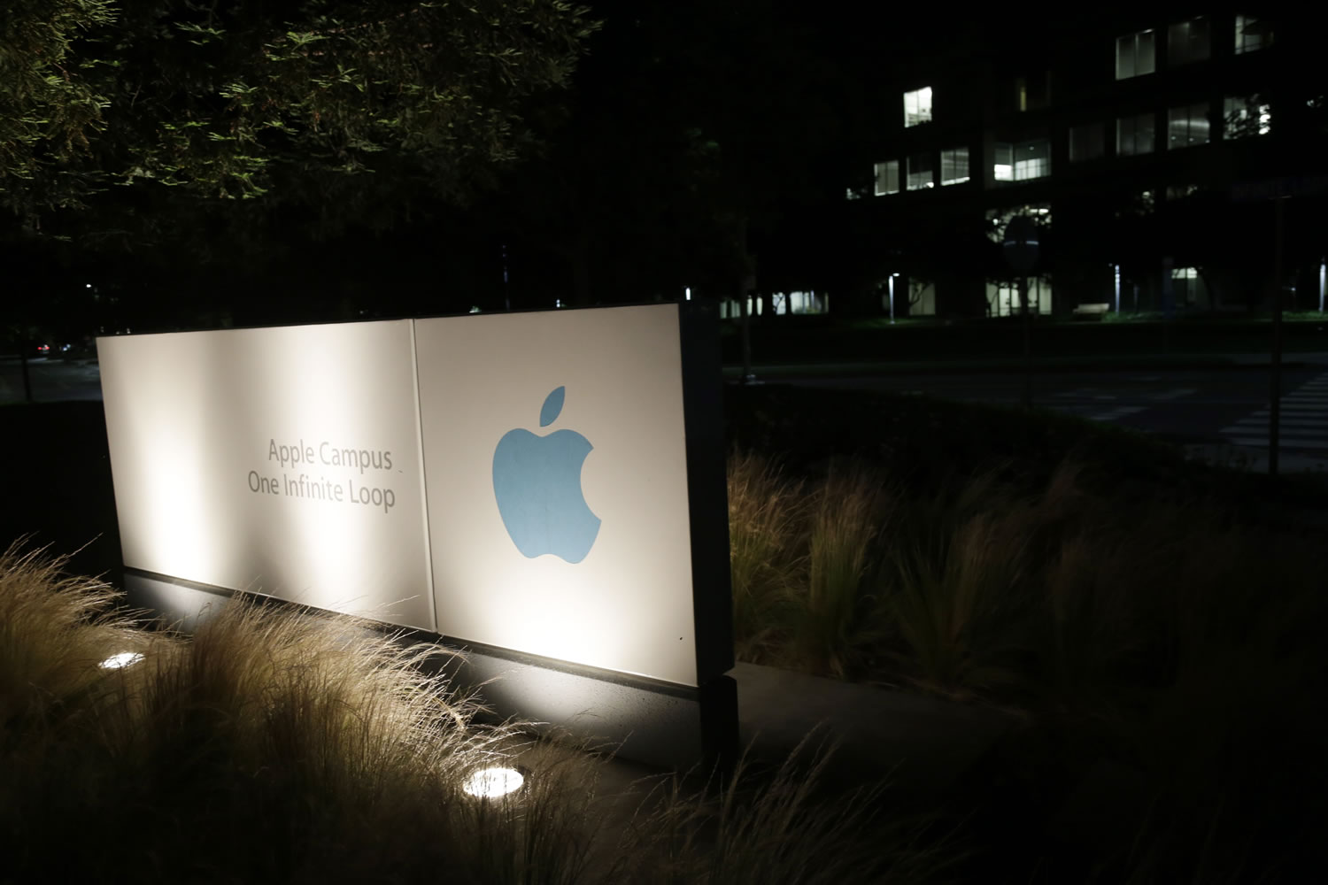 FILE - In a Friday, June 7, 2013 file photo, a sign displays the Apple logo outside of the company's headquarters in Cupertino, Calif. A federal judge ruled Wednesday, July 10, 2013 that Apple Inc. broke antitrust laws and conspired with publishers to raise electronic book prices, citing &quot;compelling evidence&quot; from the words of the late Steve Jobs. U.S. District Judge Denise Cote said Apple knew that no publisher could risk acting alone to try to eliminate Amazon.com's $9.99 price for the most popular e-books so it &quot;created a mechanism and environment that enabled them to act together in a matter of weeks to eliminate all retail price competition for their e-books.&quot;Apple spokesman Tom Neumayr said the Cupertino, California-based company planned to appeal.