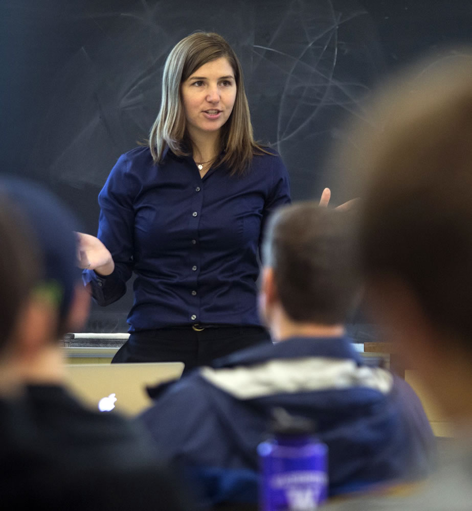 Kat Steele, an assistant professor in the UW College of Engineering, teaches a class with almost all male students Oct. 4.