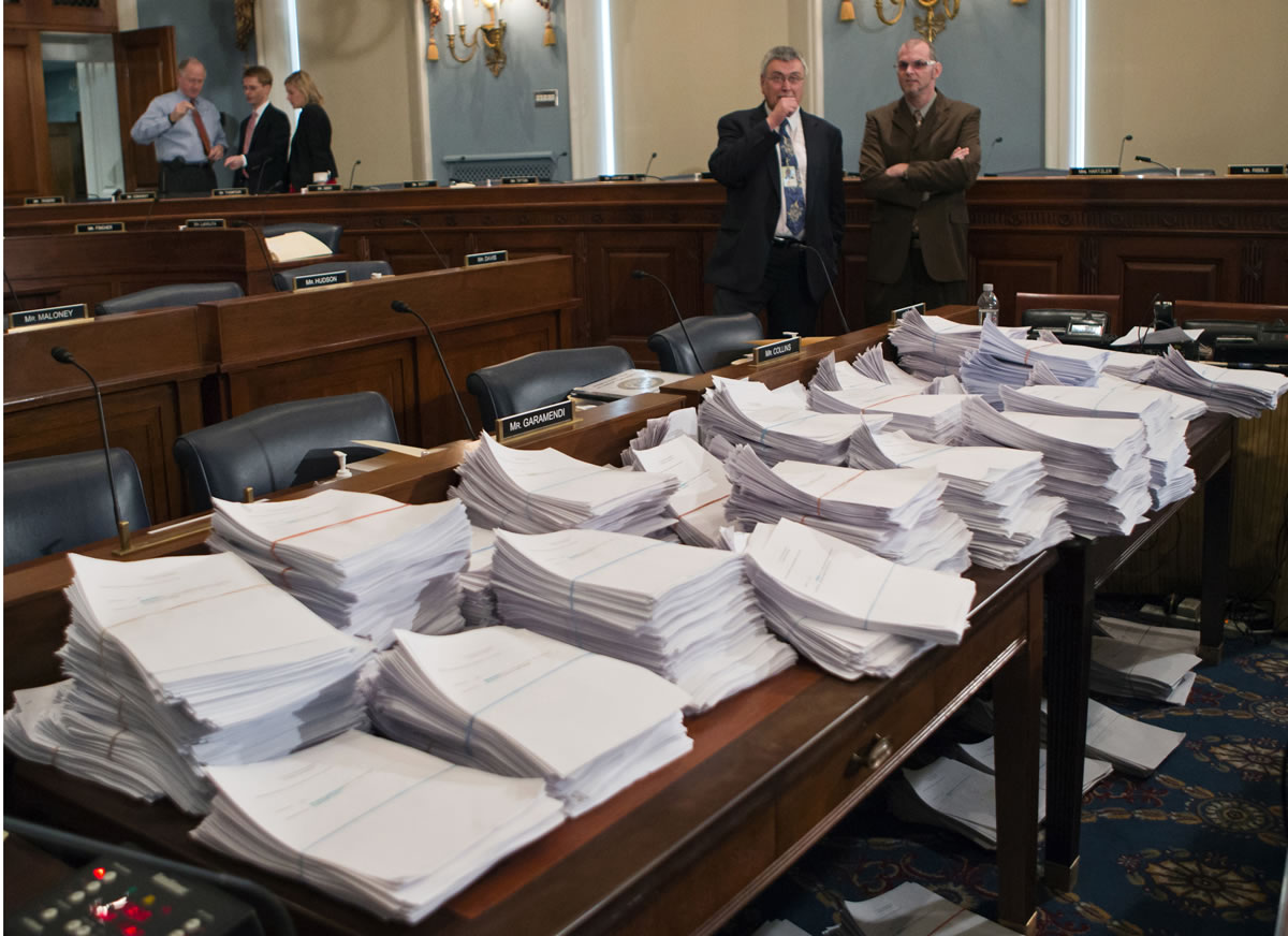 Stacks of paperwork awaiting members of the House Agriculture Committee on Capitol Hill in Washington as it meets to consider proposals to the 2013 Farm Bill in May.