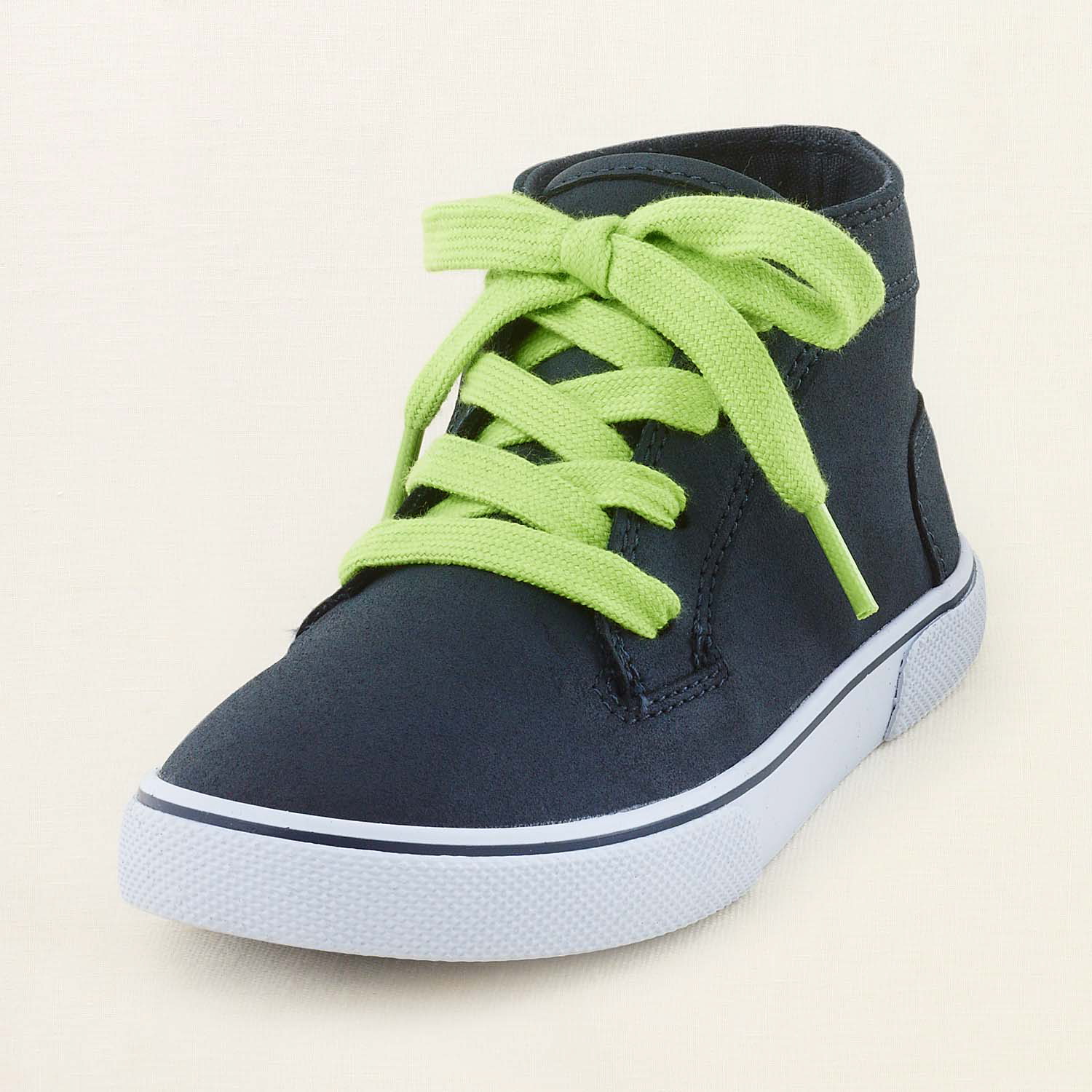 The Children's Place
A camel sneaker with orange neon laces and a navy sneaker with green neon laces.