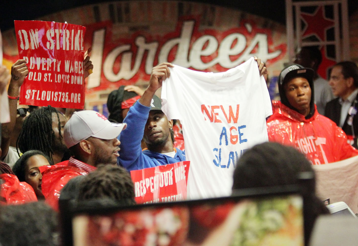 Demonstrators fill the Hardees in downtown St. Louis on July 30.