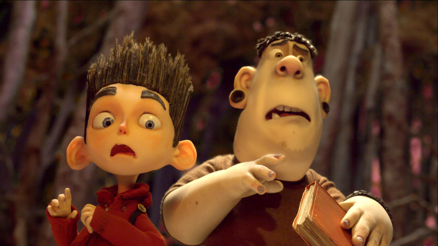 Norman is voiced by Kodi Smit-McPhee, left, and Alvin is voiced by Christopher Mintz-Plasse in the 3D stop-motion film &quot;ParaNorman.&quot;