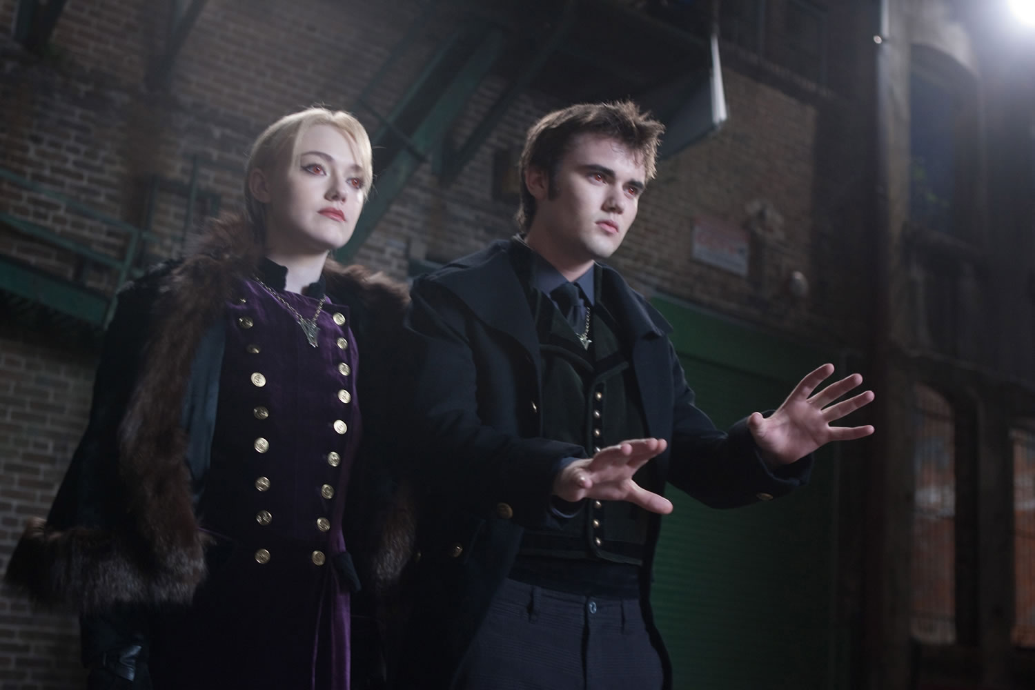 Dakota Fanning, left, and Cameron Bright as members of the Volturi in  &quot;The Twilight Saga: Breaking Dawn Part 2.&quot;