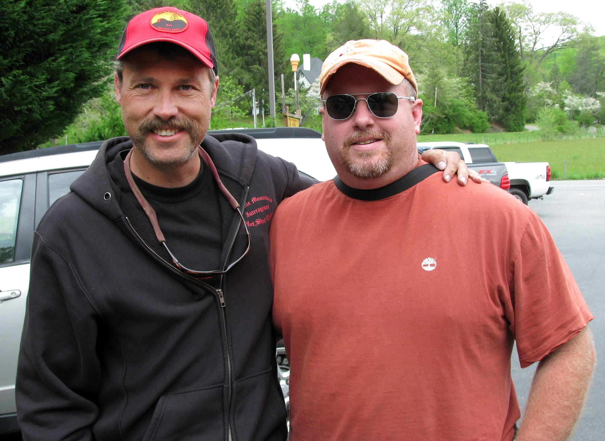 Eric Marsh, left, superintendent of the Granite Mountain Hotshots, during a visit with his cousin, Scott Marsh, in North Carolina.