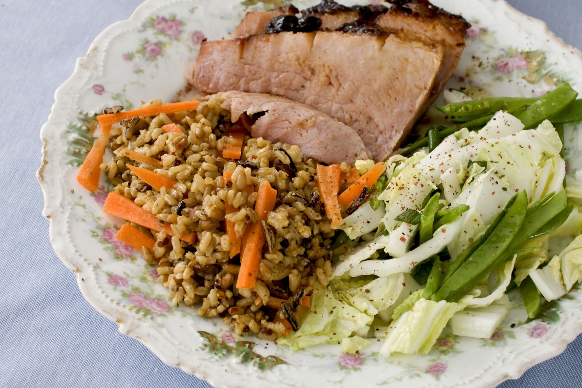 Hoisin-Glazed Ham With Napa Cabbage and Snow Pea Slaw may just please traditionalists and the adventurous.