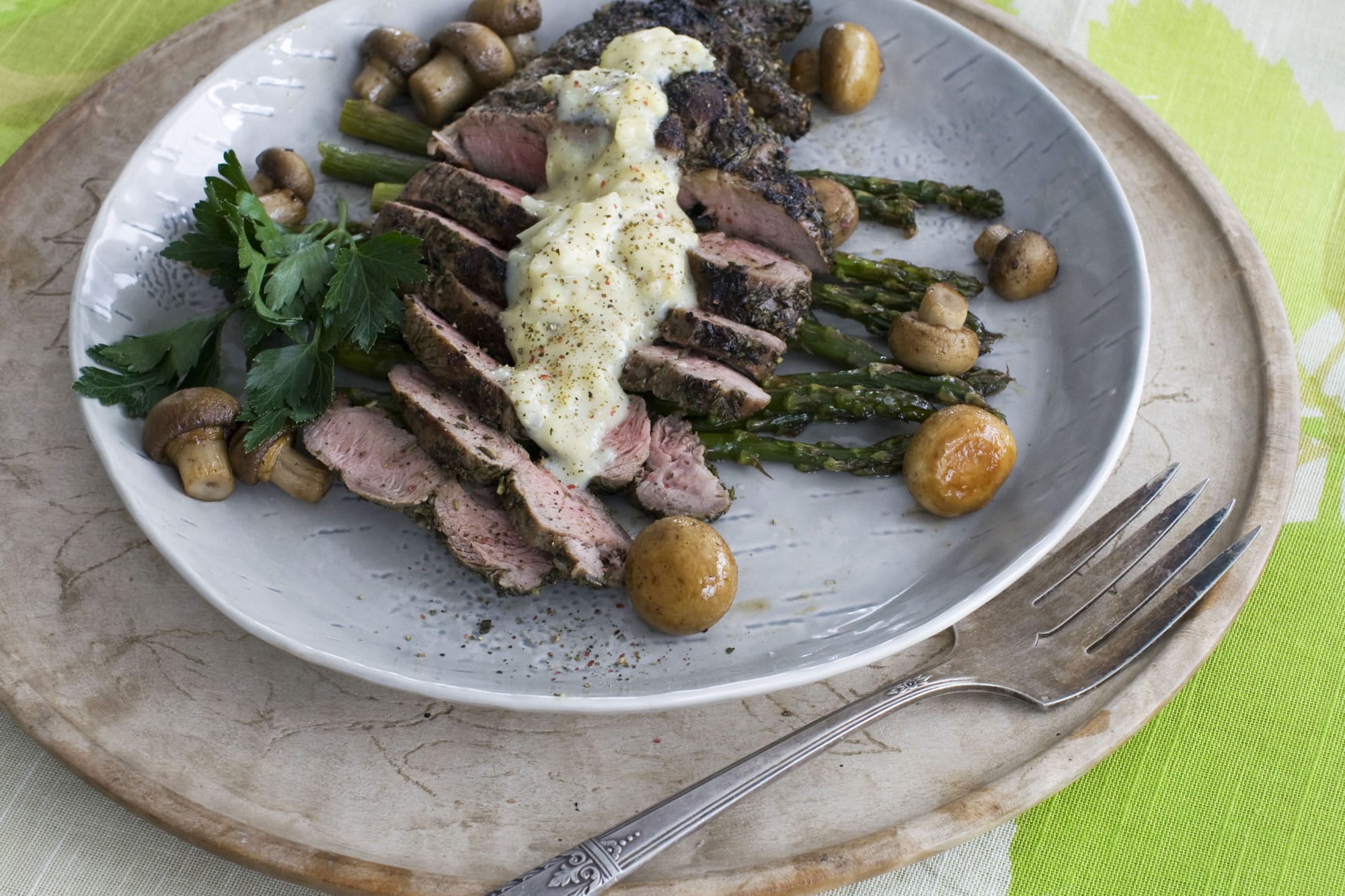 Smaller lamb steaks cut from the leg get the Mediterranean treatment in this Grilled Lamb Steaks With Artichoke Lemon Sauce recipe.