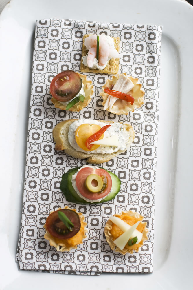 Using our building-block approach to Oscar party canapes, diners can select from a buffet of ingredients -- from bases and spreads to toppings and garnishes -- to design snacks that suit their preferences.