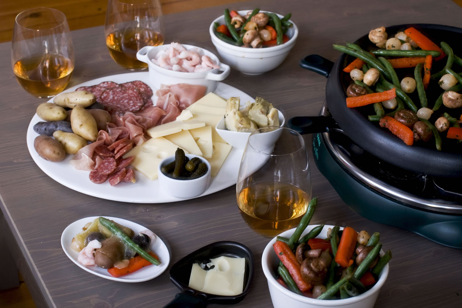 Photos by Matthew Mead/Associated Press
Raclette is a comfort food in France and Switzerland. The dish is perfect for a leisurely day after a night of partying.
