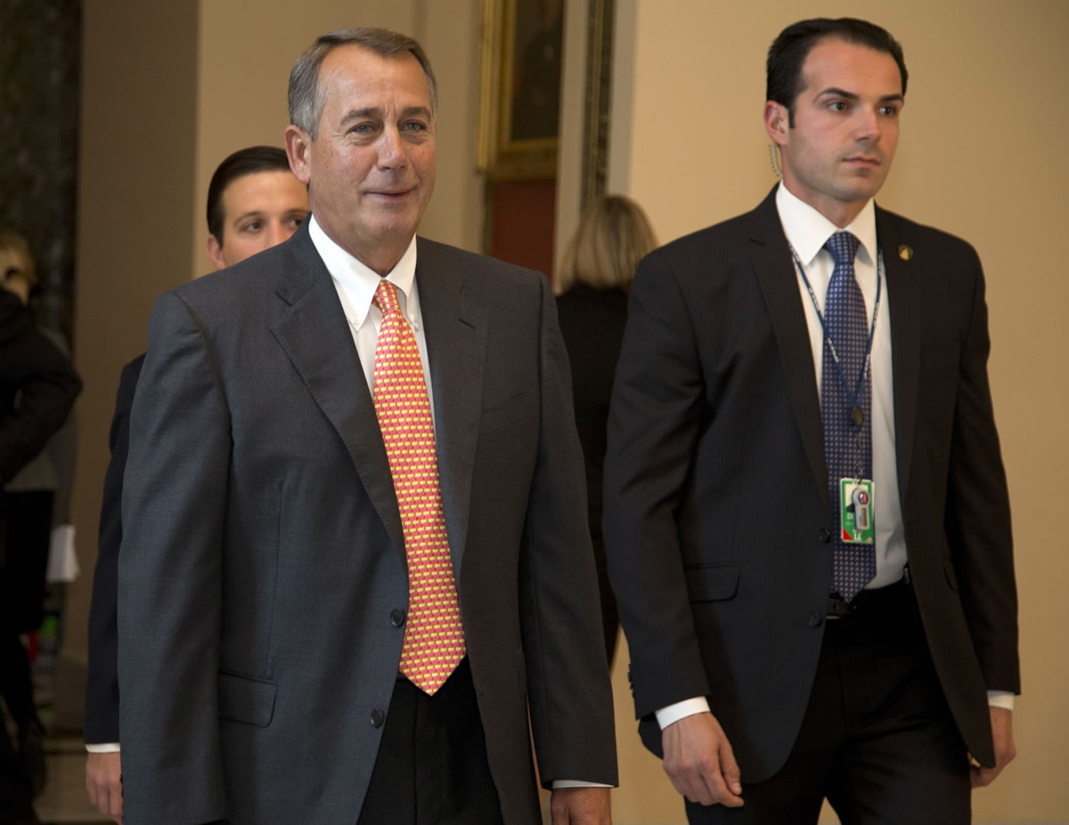 House Speaker John Boehner of Ohio walks to the vote Thursday on the House floor on Capitol Hill in Washington.