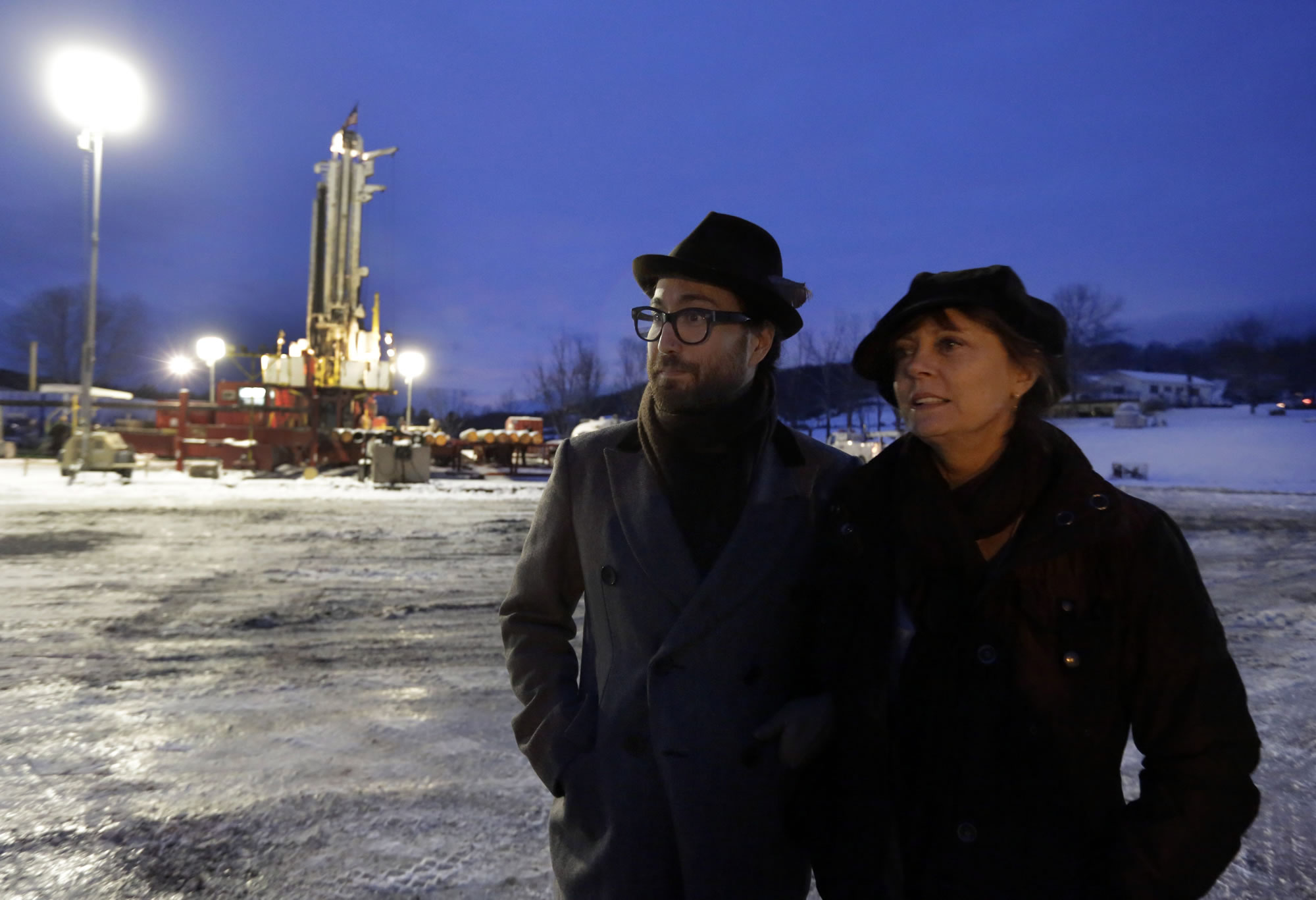 Sean Lennon and actress Susan Sarandon visit a fracking site in New Milford, Pa., in January. Dozens of celebrities may be running afoul of the law as they unite under the banner of one group that is seeking to prevent a method of gas drilling in New York state.
