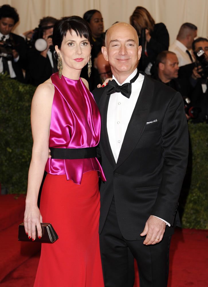 Mackenzie, left, and Jeff Bezos arrive May 7 at a Metropolitan Museum of Art Costume Institute gala benefit in New York. The couple announced Friday that they are giving $2.5 million to the campaign to defend Washington's same-sex marriage law.